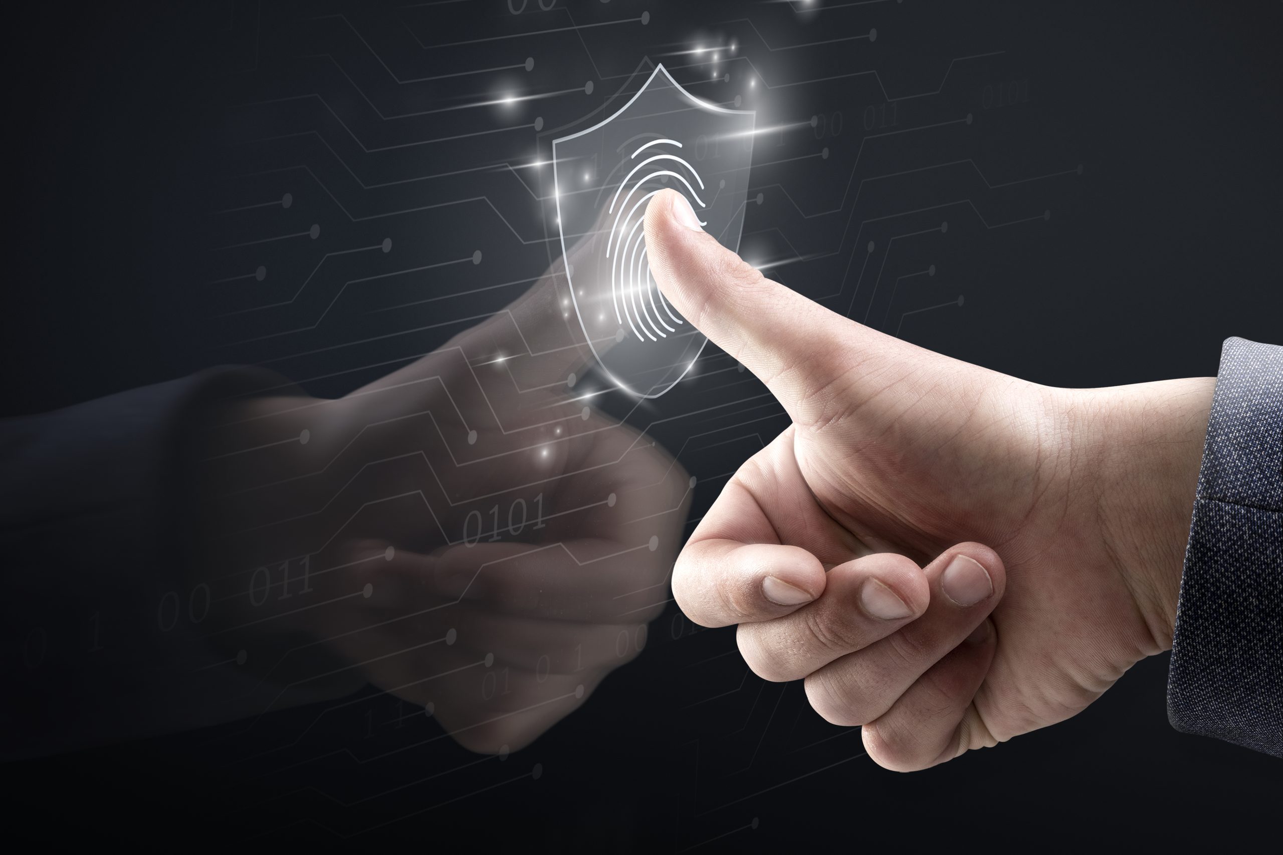 pouce sur un lecteur biométrique à empreinte digitale